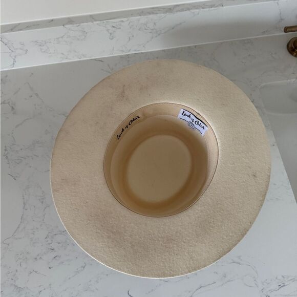 Lack of color Stylish Cream Hat with Blue Patterned Band worn once